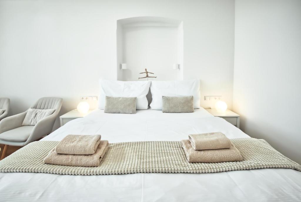 Postel nebo postele na pokoji v ubytování Apartmány VIENNA