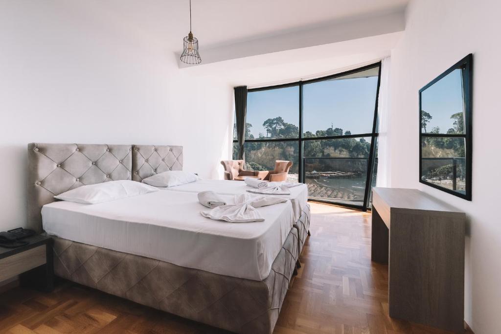 Postel nebo postele na pokoji v ubytování ApartHotel Cruiser Luxury