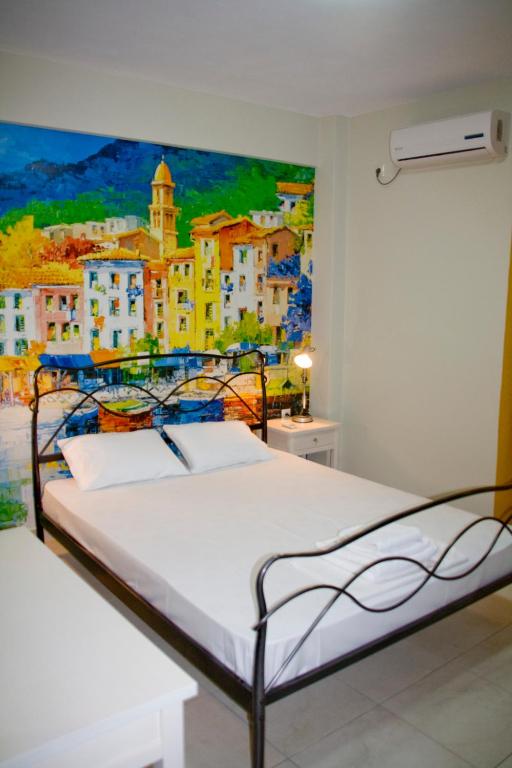 Postel nebo postele na pokoji v ubytování Fournia Village