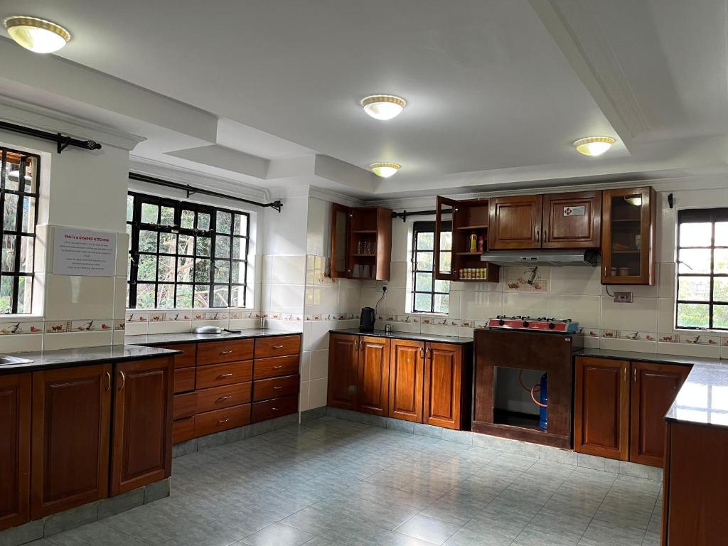 Kuchyň nebo kuchyňský kout v ubytování Nairobi Nomad Backpackers Hostel