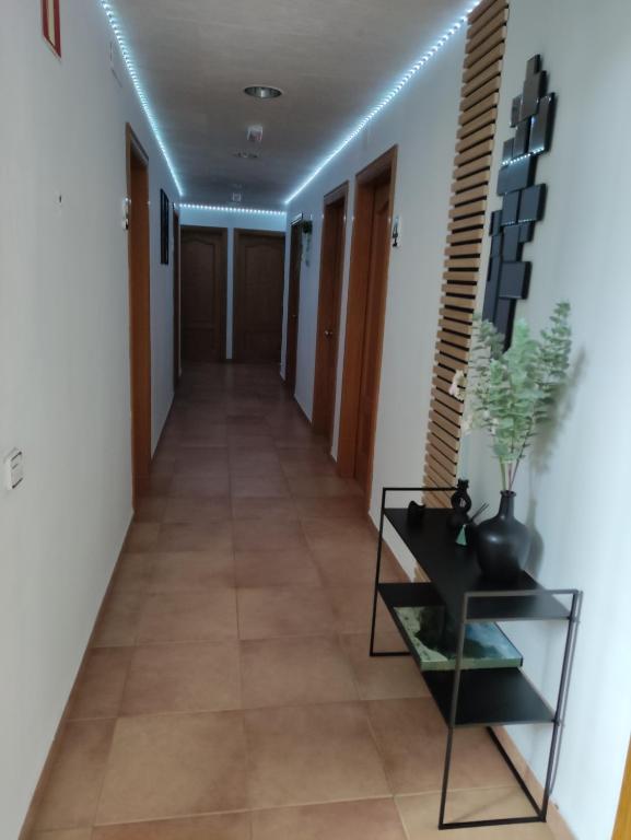 TV a/nebo společenská místnost v ubytování Hostal Turbon