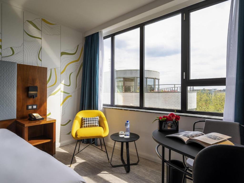 Postel nebo postele na pokoji v ubytování Mercure Antwerp City Centre