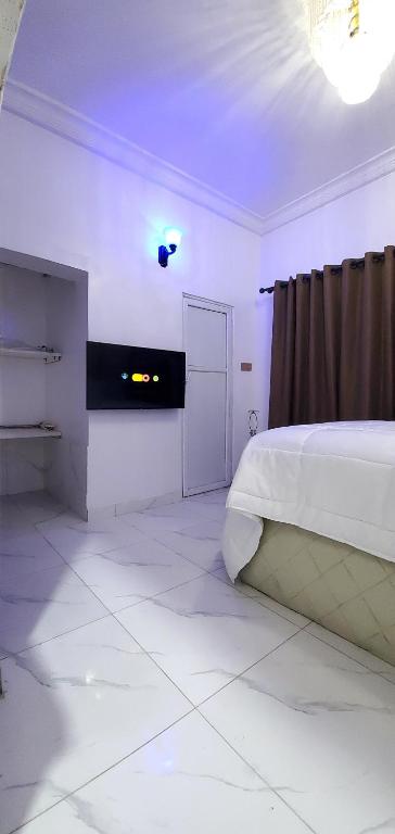 Postel nebo postele na pokoji v ubytování REGNO Apartment
