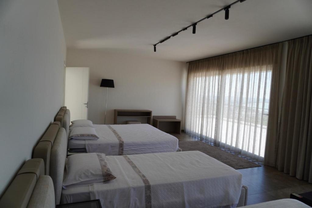 Postel nebo postele na pokoji v ubytování Villa Esmi Durres