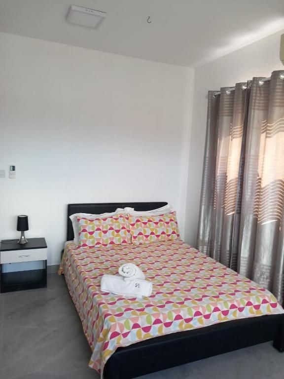 Postel nebo postele na pokoji v ubytování Ibis Tourist Residence 1