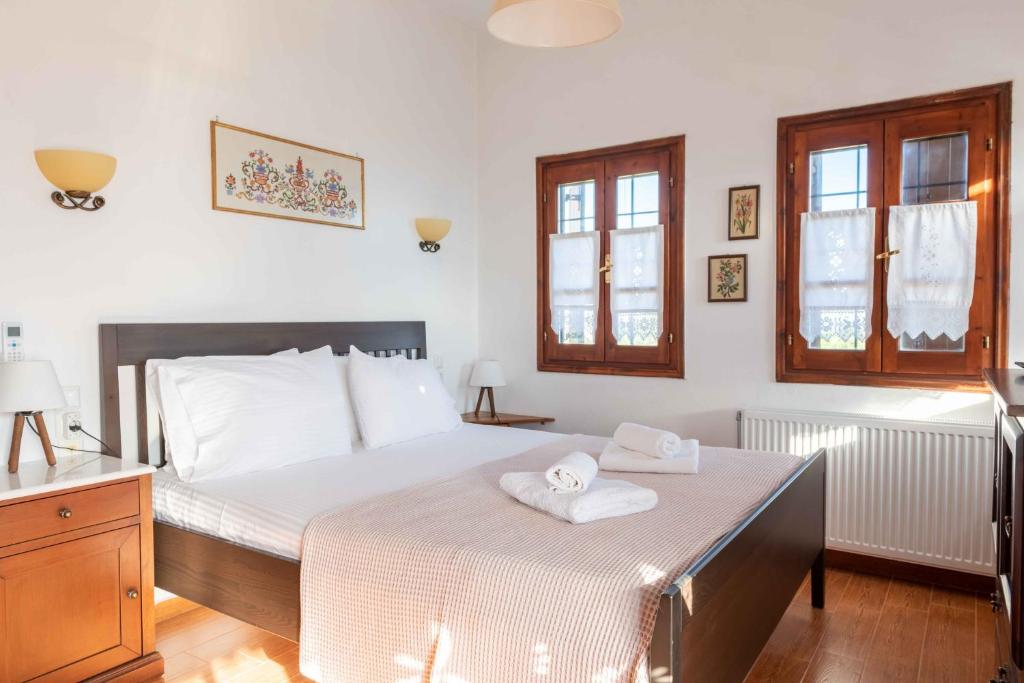 Posteľ alebo postele v izbe v ubytovaní Petrichor houses