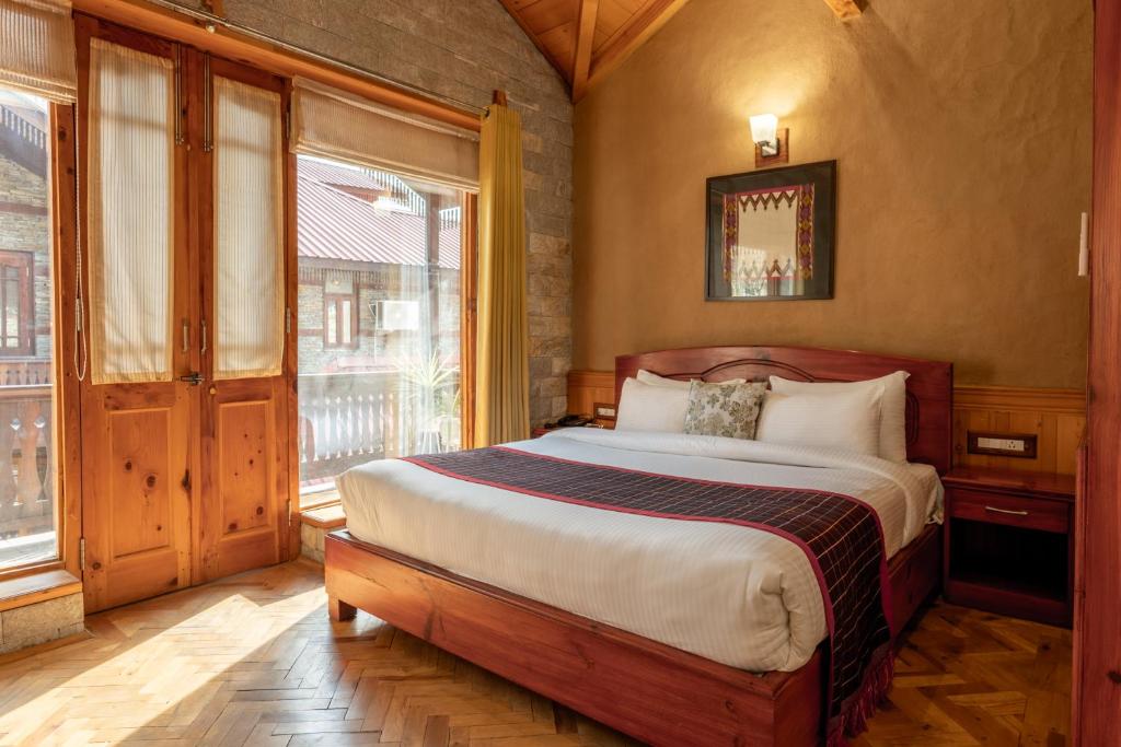 Postel nebo postele na pokoji v ubytování Shivadya - A Luxury Boutique Experience