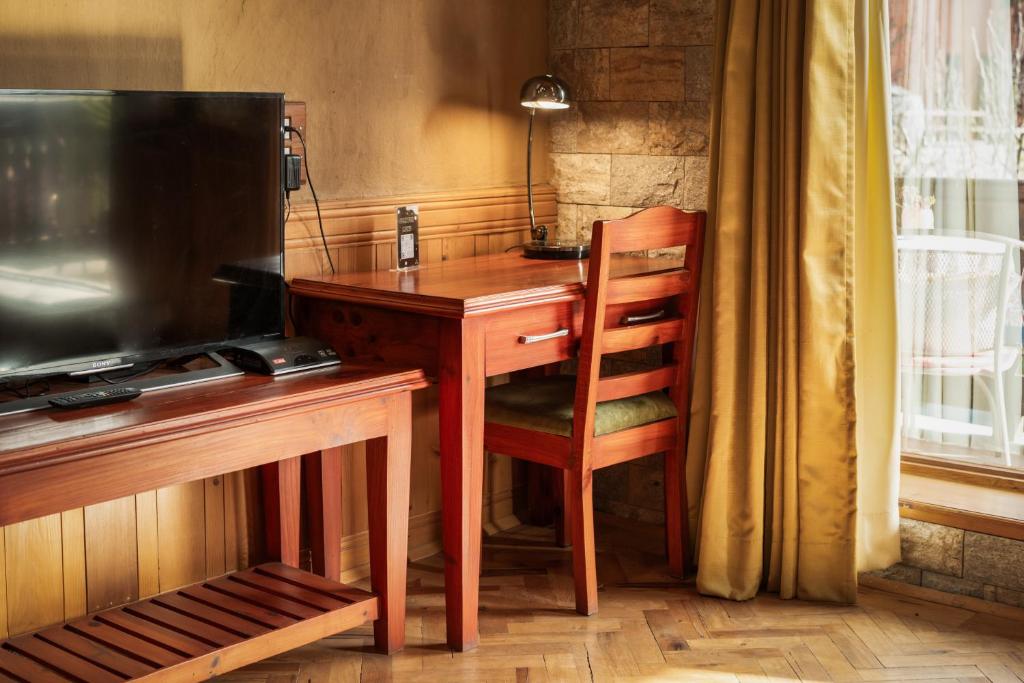 TV a/nebo společenská místnost v ubytování Shivadya - A Luxury Boutique Experience