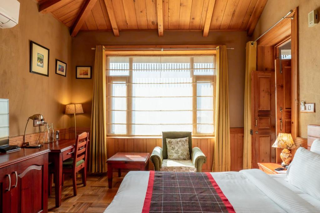 Postel nebo postele na pokoji v ubytování Shivadya - A Luxury Boutique Experience