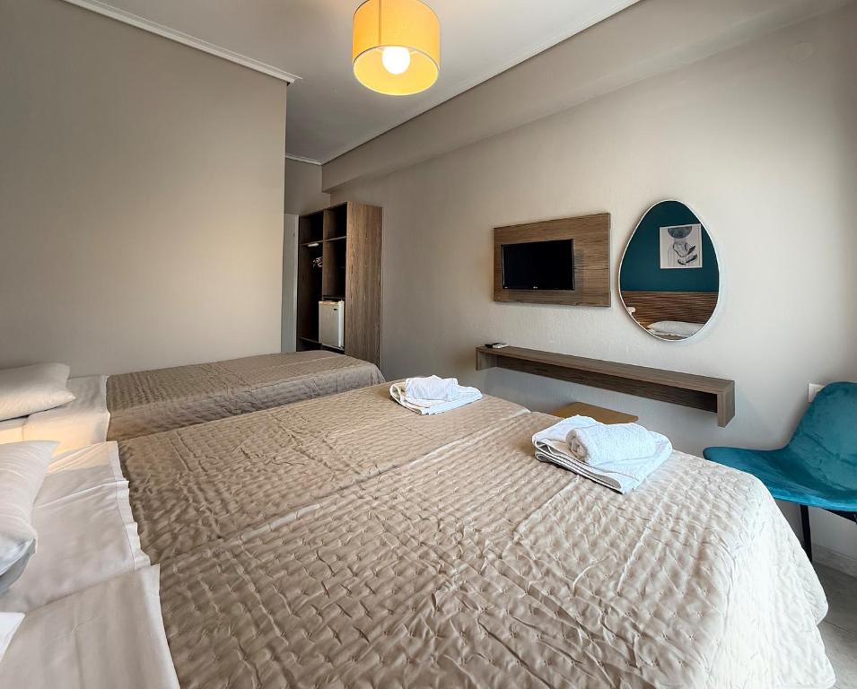 Postel nebo postele na pokoji v ubytování Hotel Thermaikos