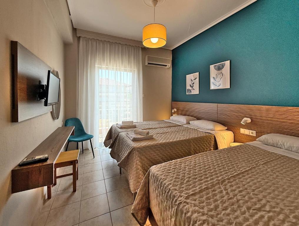 Postel nebo postele na pokoji v ubytování Hotel Thermaikos