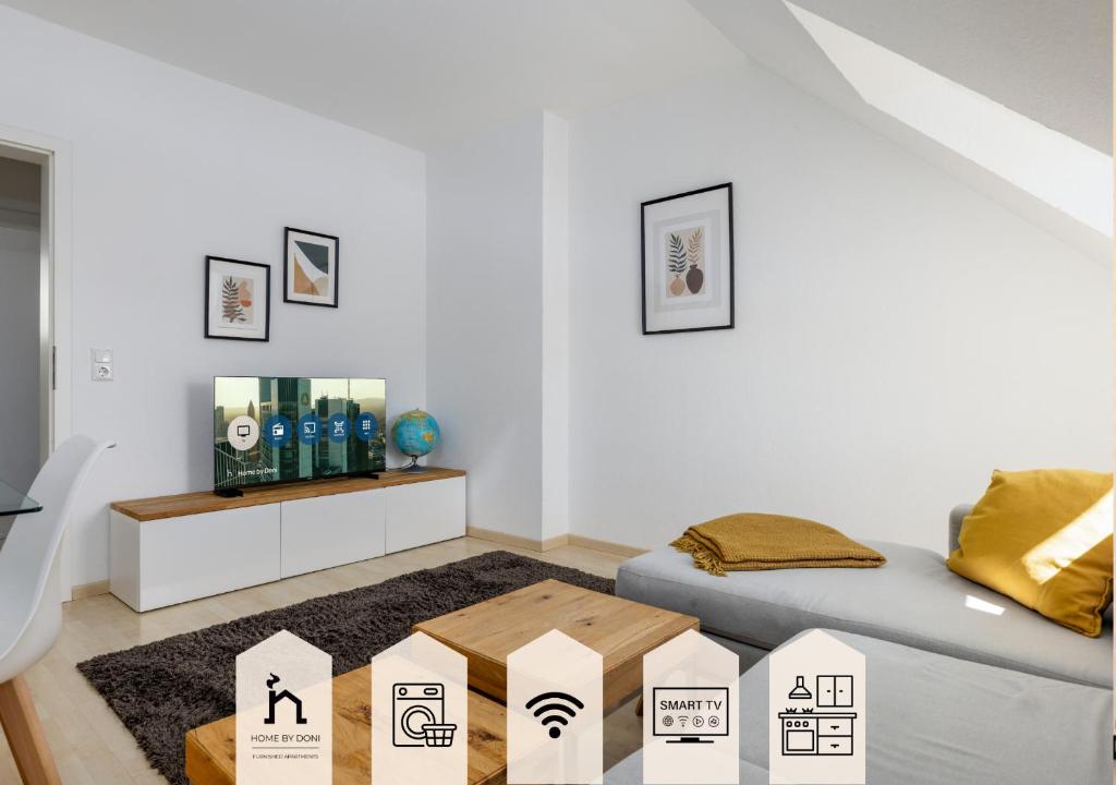 ein weißes Zimmer mit einem Bett und einem Tisch in der Unterkunft Home by Doni I serviced apartments I ruhig I zentral nahe RMCC, Staatsheater & Landtag in Wiesbaden