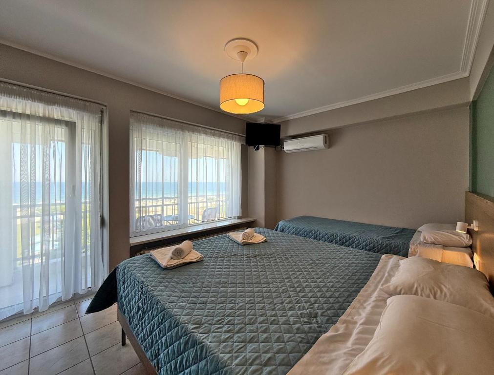 Postel nebo postele na pokoji v ubytování Hotel Thermaikos