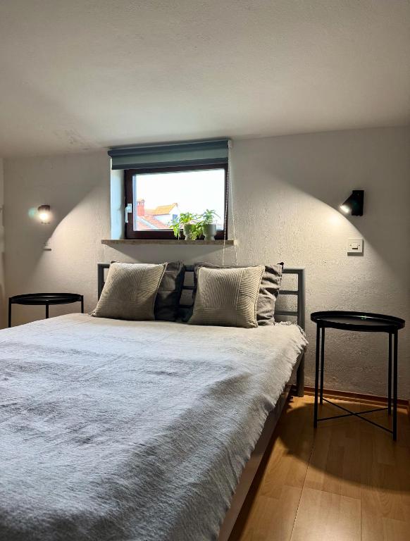 Postel nebo postele na pokoji v ubytování Apartments & Zimmer Jasmine
