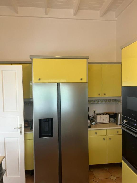 Kuchyň nebo kuchyňský kout v ubytování Villa Les Nereides