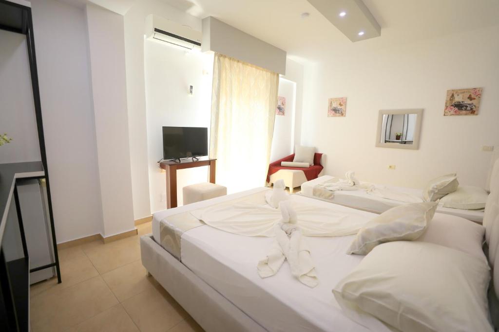 TV a/nebo společenská místnost v ubytování Hotel Soan