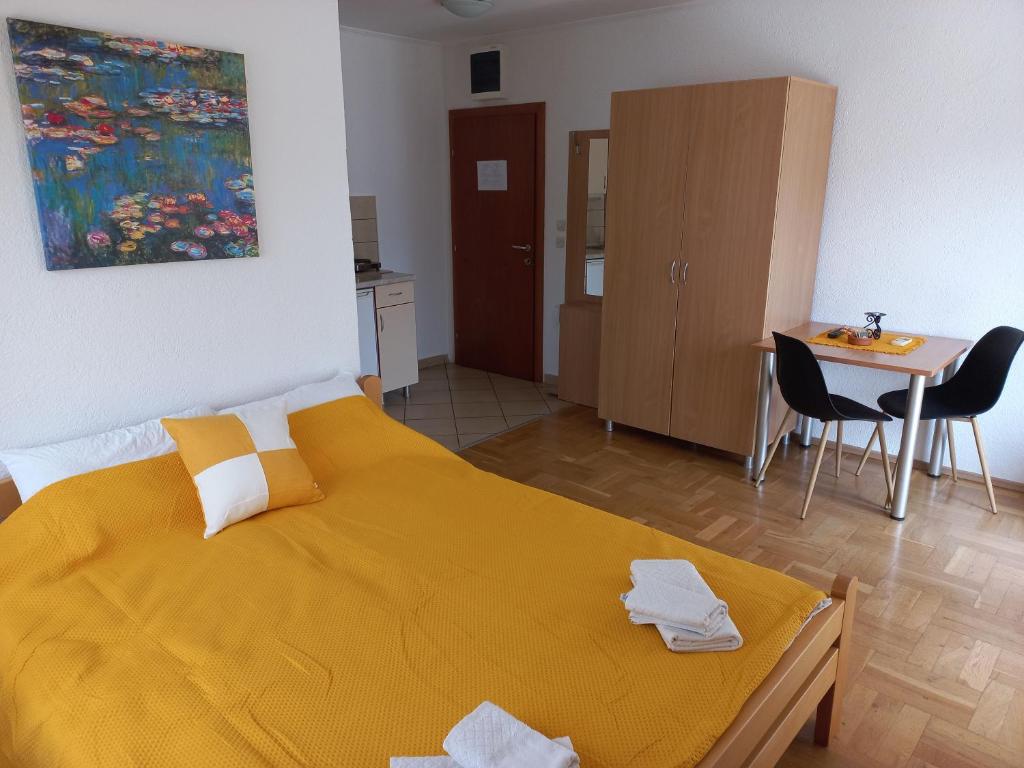 Postel nebo postele na pokoji v ubytování Villa Afrodita