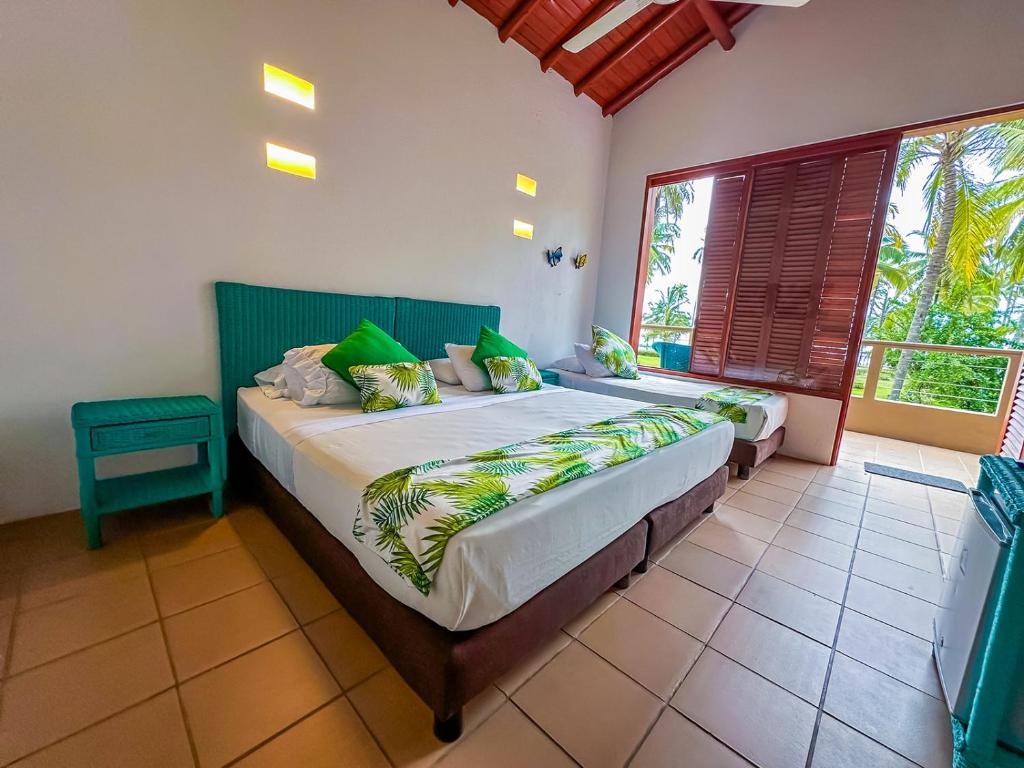 Una cama o camas en una habitación de Hotel Chiniu