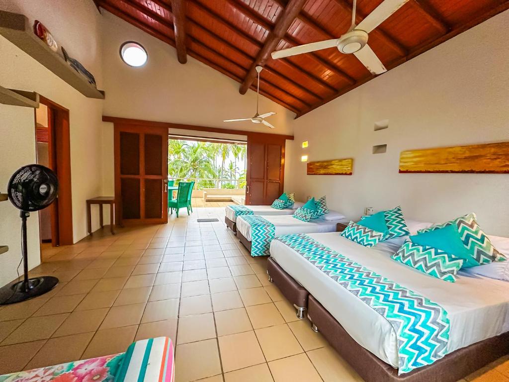 Una cama o camas en una habitación de Hotel Chiniu