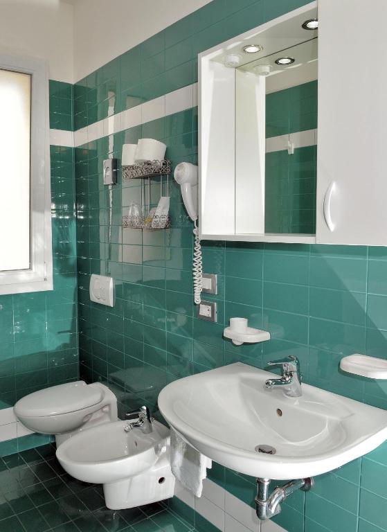 Koupelna v ubytování Hotel Raffaello
