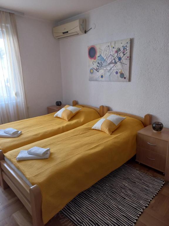 Postel nebo postele na pokoji v ubytování Villa Afrodita
