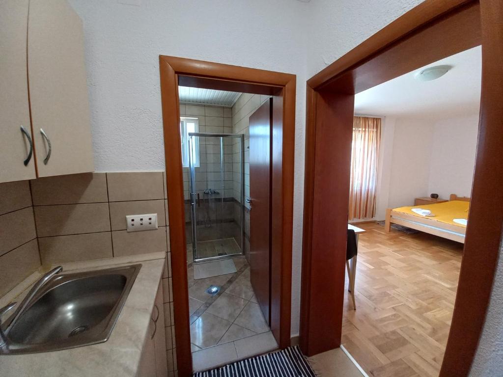 Postel nebo postele na pokoji v ubytování Villa Afrodita