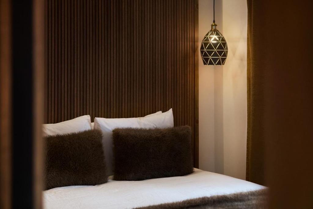 Voodi või voodid majutusasutuse Motel Boutique Hygge toas