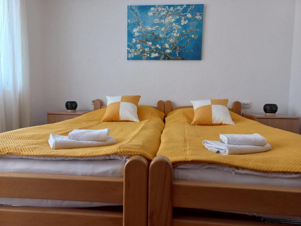Postel nebo postele na pokoji v ubytování Villa Afrodita