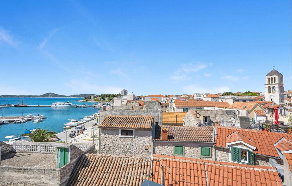a view of a city with boats in the water at 1 Bedroom Beautiful Apartment In Vodice in Vodice