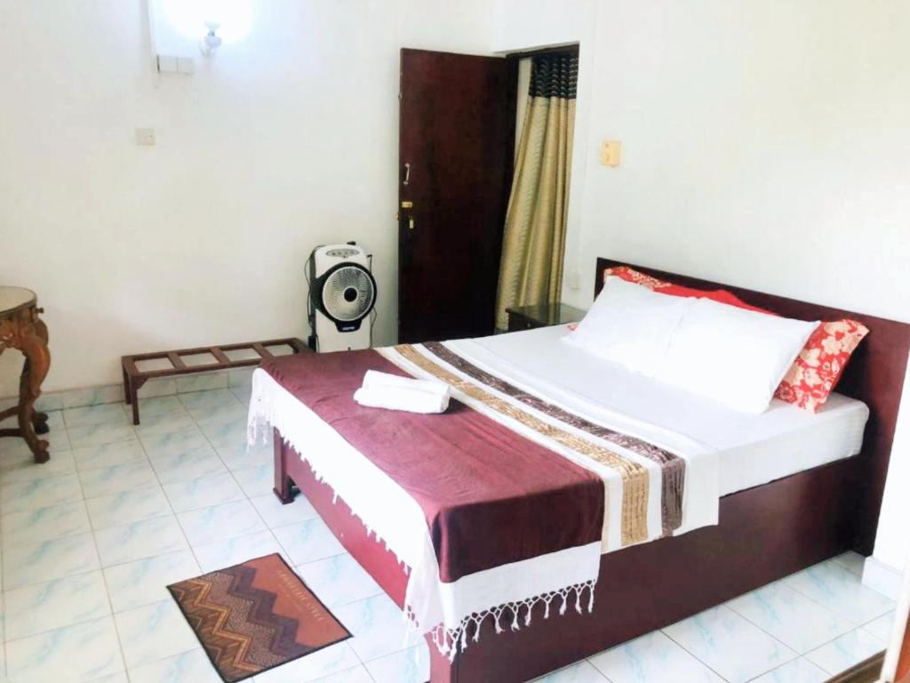 Postel nebo postele na pokoji v ubytování Chandi Mahal HomeStay