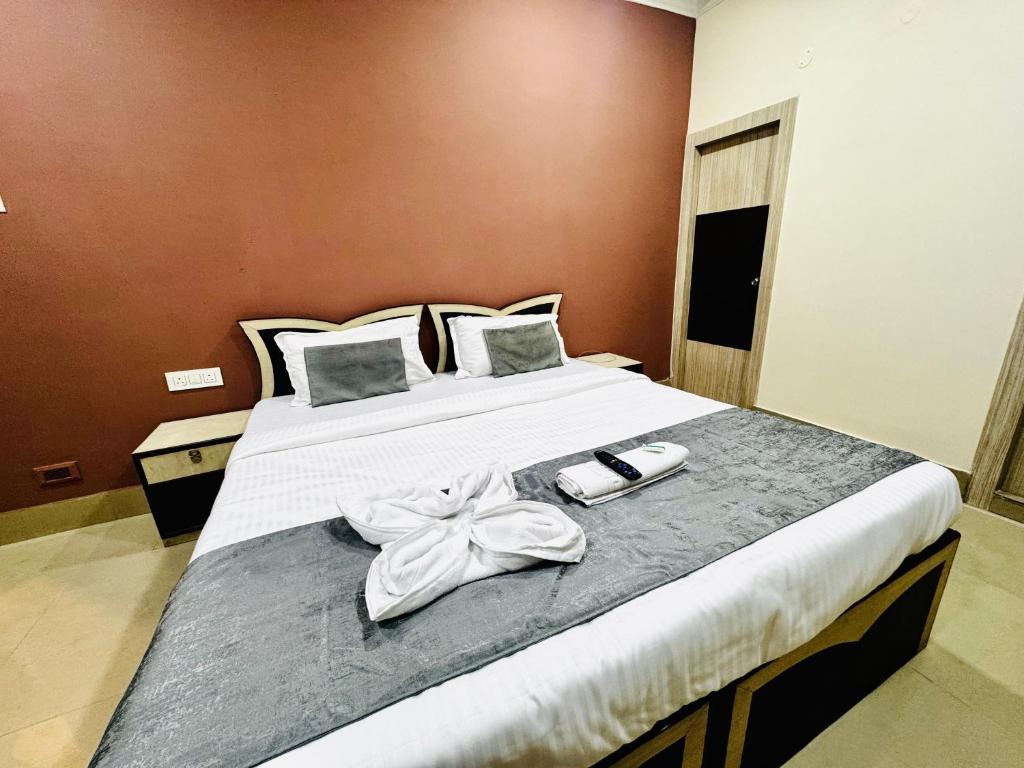 Postel nebo postele na pokoji v ubytování RM Guest Home