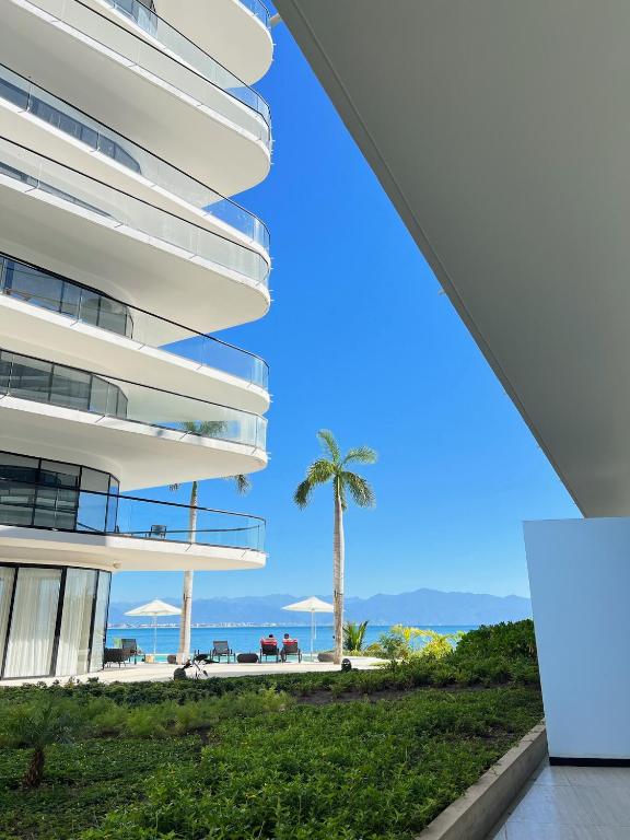 a view of the ocean from the side of a building at Tizate Residents 202 in Cruz de Huanacaxtle