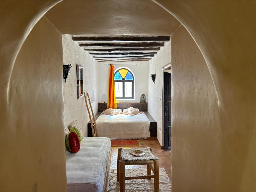 Postel nebo postele na pokoji v ubytování Riad Eucalyptus, Ethnic Hotel
