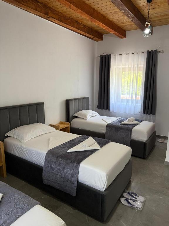 Postel nebo postele na pokoji v ubytování Guesthouse Te Tata