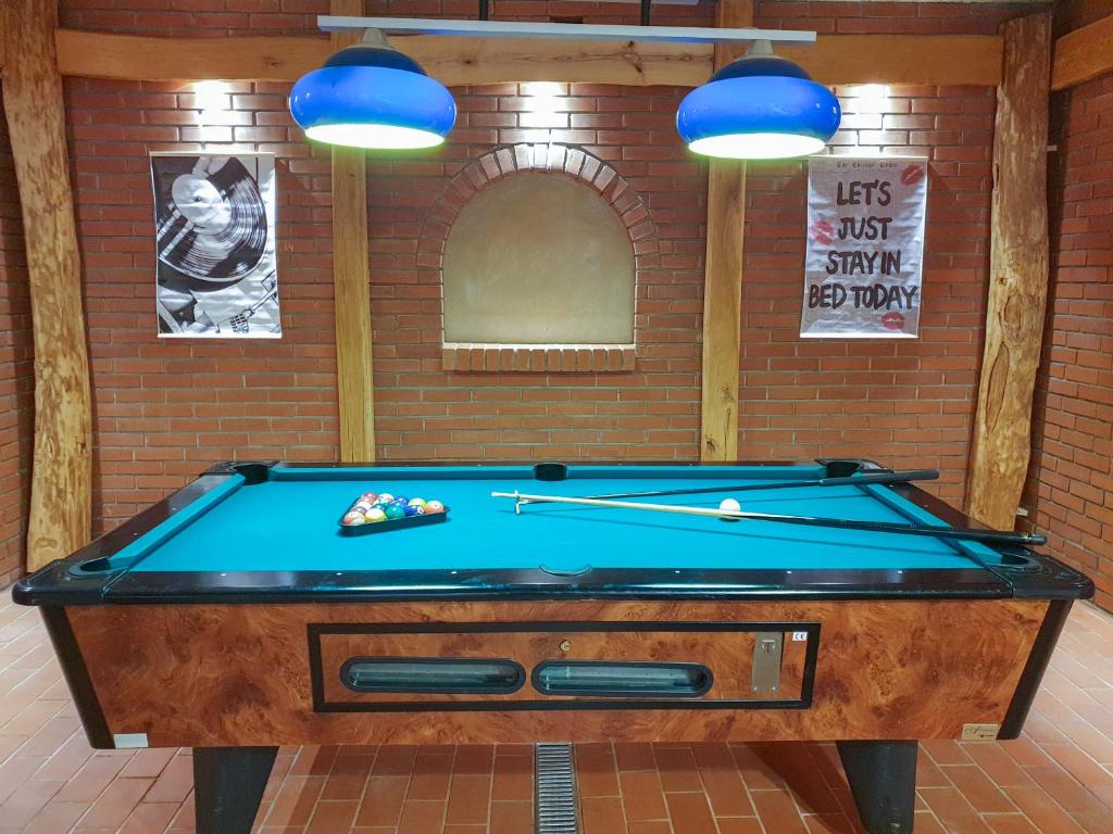Biliár nebo kulečník v ubytování Apartment Feher Lendava