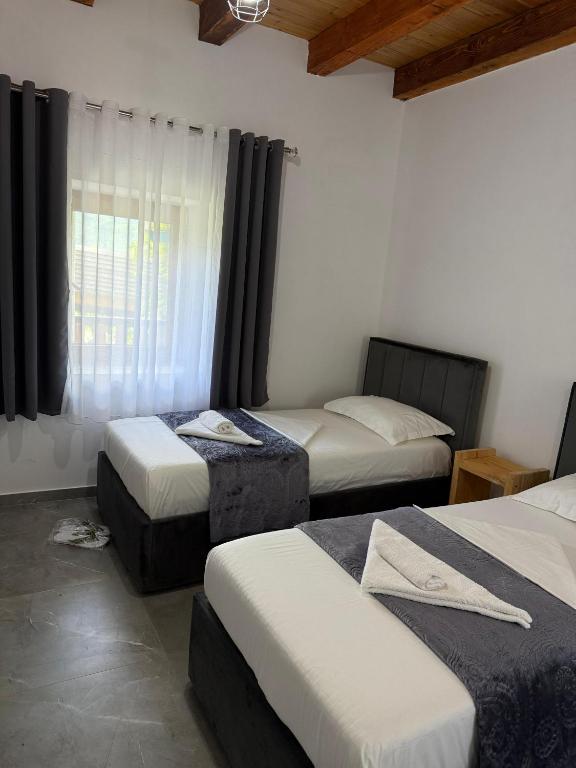 Postel nebo postele na pokoji v ubytování Guesthouse Te Tata