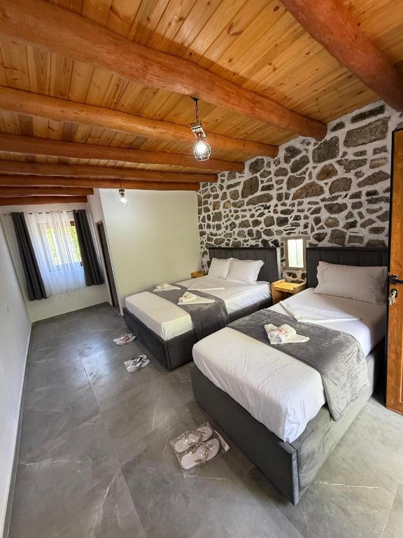 Postel nebo postele na pokoji v ubytování Guesthouse Te Tata
