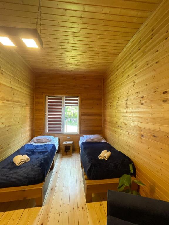 Postel nebo postele na pokoji v ubytování Cottage Shgedi