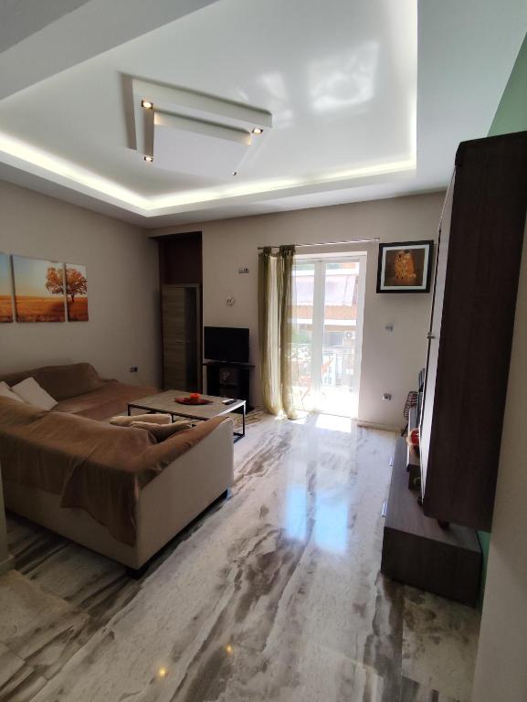 Postel nebo postele na pokoji v ubytování Elegant apartment close to Piraeus Port
