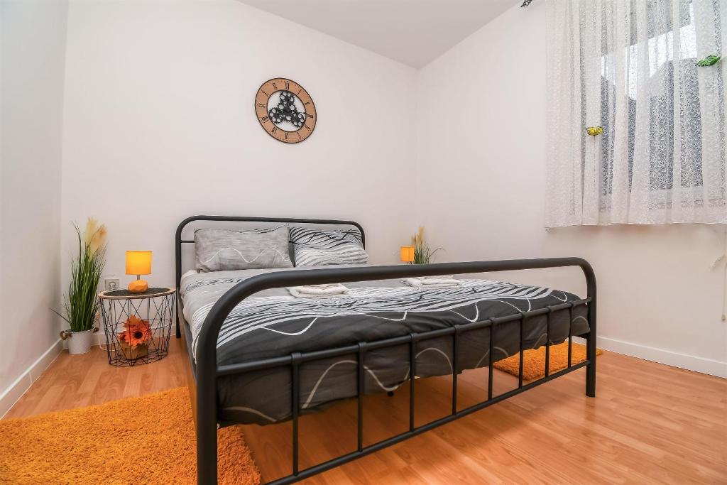 Postel nebo postele na pokoji v ubytování Apartment Olga