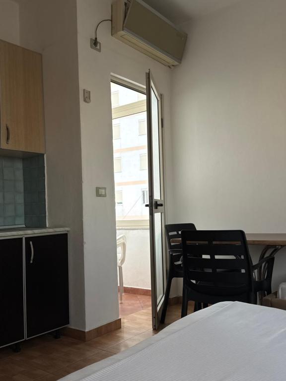 Postel nebo postele na pokoji v ubytování GuestHouse Cami