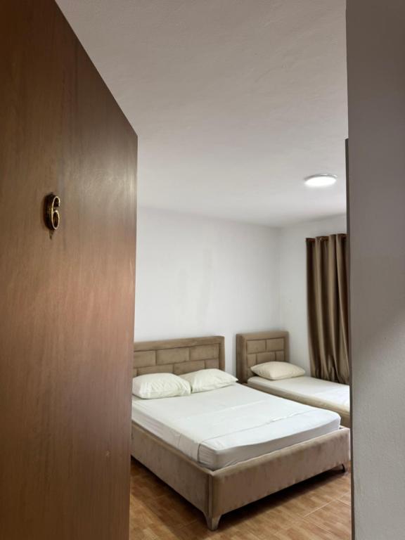 Postel nebo postele na pokoji v ubytování GuestHouse Cami