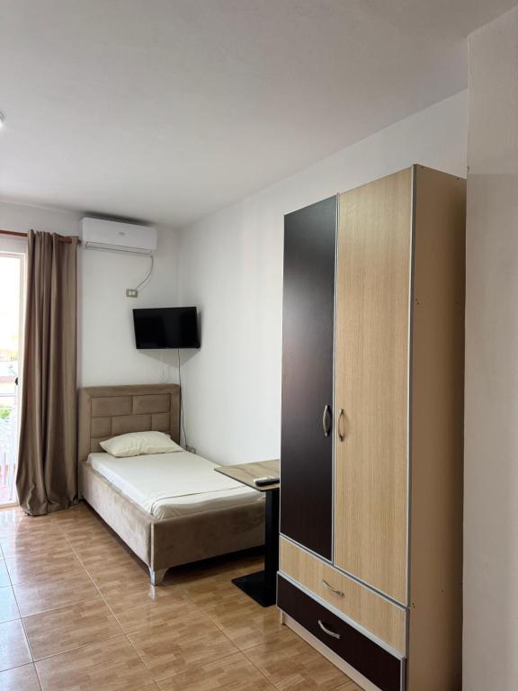 Postel nebo postele na pokoji v ubytování GuestHouse Cami