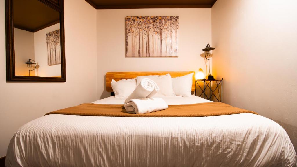 Postel nebo postele na pokoji v ubytování Park City Hostel