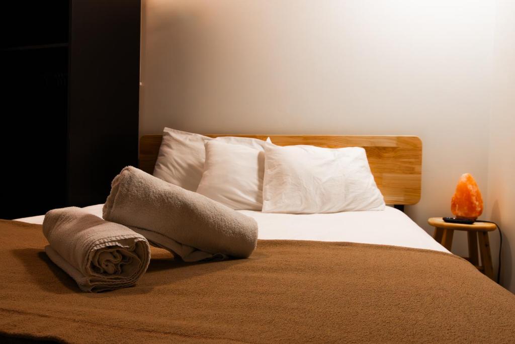 Postel nebo postele na pokoji v ubytování Park City Hostel