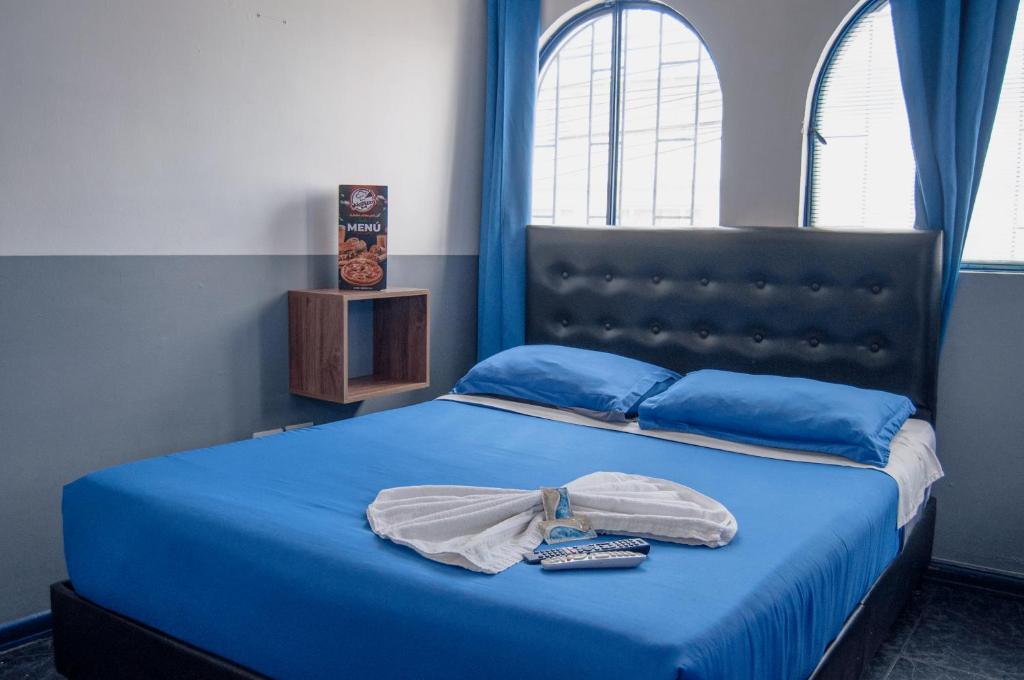 Postel nebo postele na pokoji v ubytování Airport Azul