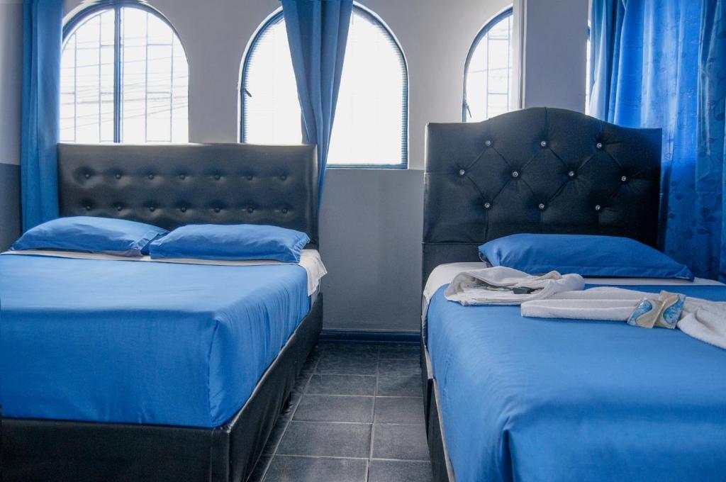 Postel nebo postele na pokoji v ubytování Airport Azul