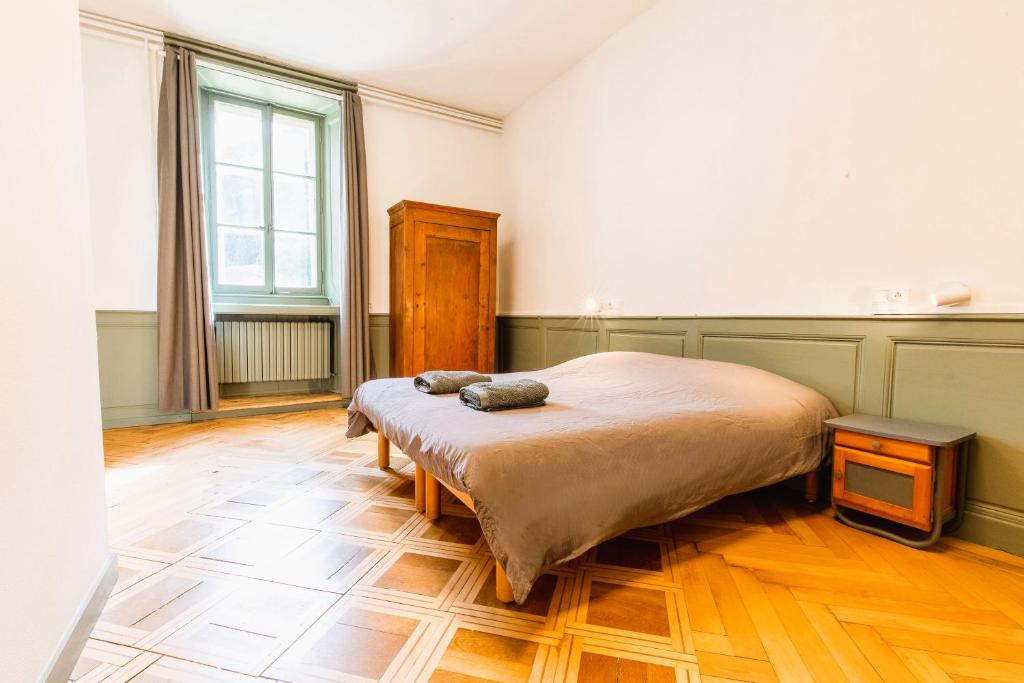Postel nebo postele na pokoji v ubytování Monastère du Val de Consolation