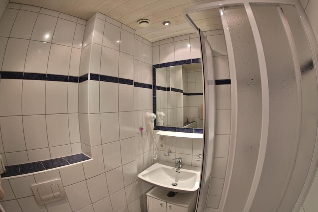 Koupelna v ubytování Hotel Stecher