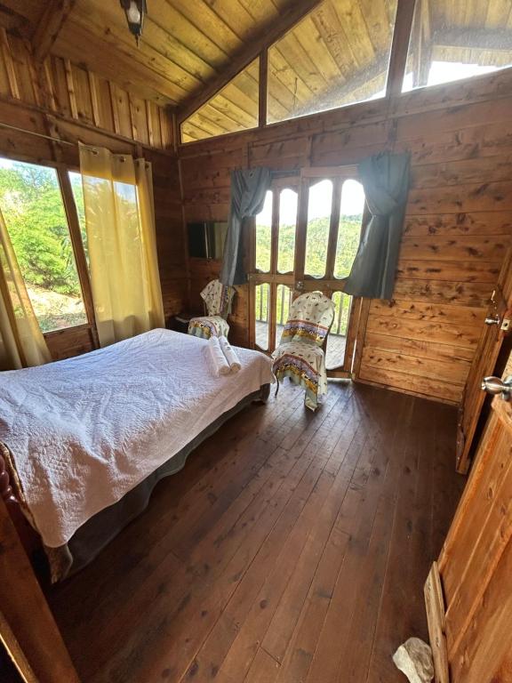 Postel nebo postele na pokoji v ubytování Cabañas la esperancita